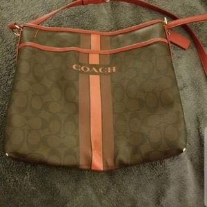 Brown and red coach bag with matching wristlet
